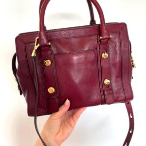 Michael Kors handbag. Burgundy color
